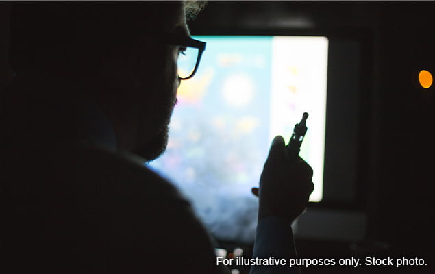 Man checking vape